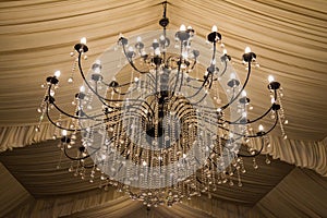 A bid chandelier in a weddings hall