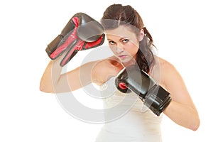 Bide wearing wedding dress and boxing gloves photo