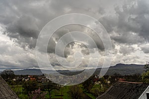 Biew on a Beautiful dramatic sky over mountain valley