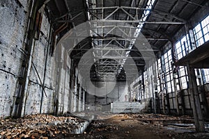 Big abandoned industrial hall or hangar of ruined factory or warehouse in Voronezh