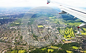 Big airplane begins to decline and prepares for landing in Heathrow Airport . London. UK