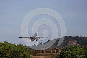 Big airplane Boeing 737 takes off from the runway