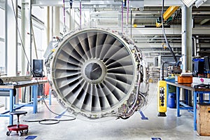 Big airplane engine during maintenance