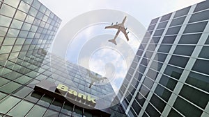 Big airplane flying over bank buildings