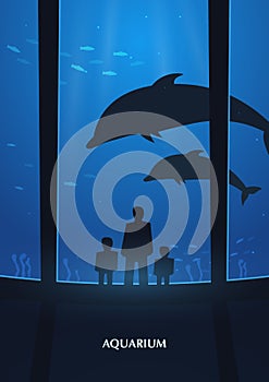 Big Aquarium or Dolphinarium With dolphin. People with children watching the underwater world.
