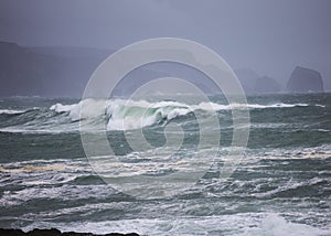 Big Atlantic waves roll ashore during a winter storm photo