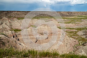 Big Badlands Overlook in Badlands National Park, as a thunderstorm rolls in