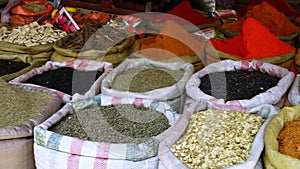 Big bags of spices in a market