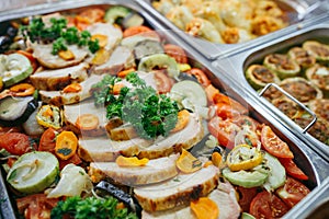 Big banquet table with chafing dish heaters