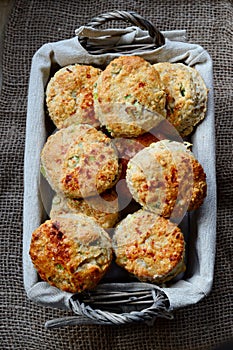 A big batch of homemade scones in a basket