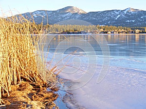 BIG BEAR LAKE SHORELINE WITH ICE AND SNOW