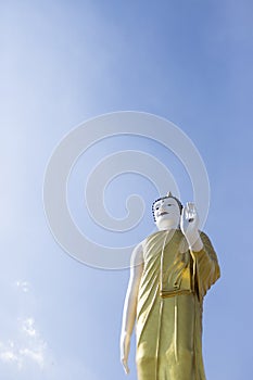 Big beautiful buddha statue with blue sky