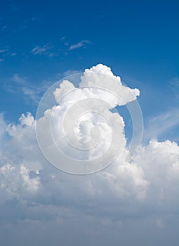 Big beautiful cloud in the blue clear sky in summer sunny day concept