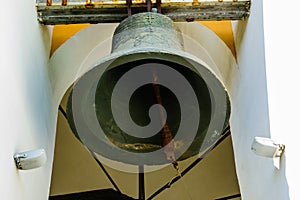 Big bell on the bell tower of church