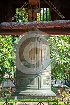 Big bell on side of Imperial Academy in Temple of Literature Van Mieu, the first national university in Hanoi