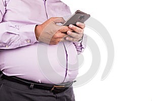 Big belly man with visceral subcutaneous fats in tight shirt photo