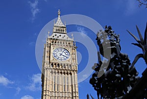 Big Ben Clock Tower in London and houses of parliament, UK, in a sunny day.