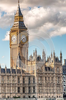 The Big Ben and Houses of Parliament against blue sky - London,