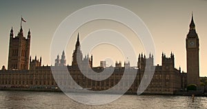 Big Ben and the Houses of Parliament alongside the River Thames at dusk, London, England