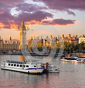 Big Ben and Houses of Parliament with boat in London, England, UK
