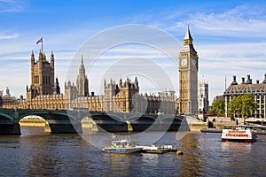 Big Ben and Houses of Parliament on Thames river