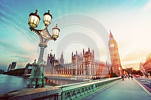 Big Ben, London the UK at sunset. Retro street lamp light on Westminster Bridge. Vintage