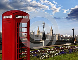 Big Ben with red phone booth in London, England