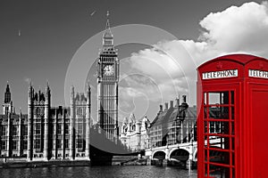 Big Ben with red phone booth in London, England photo