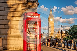 Big Ben with red phone booth in London, England, UK