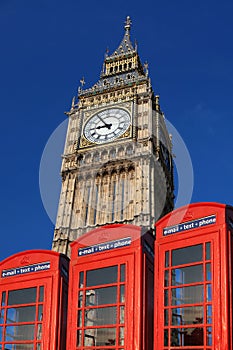 Big Ben with red phone boxes, London