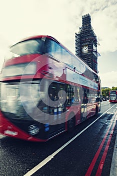 Big Ben Under Conservation Works and Red double decker bus in mo