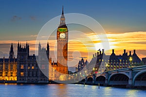 Big Ben and Westminster Bridge in London at sunset, UK photo