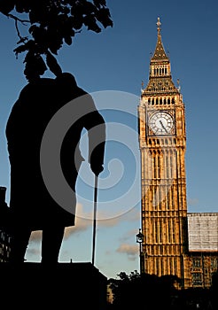 Big Ben and Winston Churchill's statue at sunset