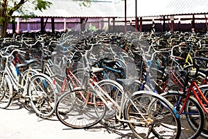 Big bicycle parking with lot of bicycles. Sport concept with bicycle. Pile of bikes in the street.