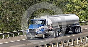 Big Blue Diesel Truck On Bridge