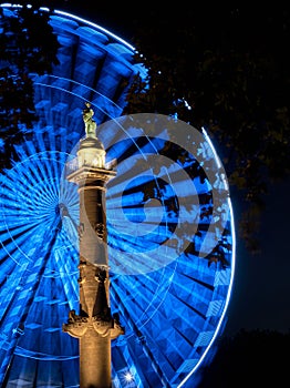 Big blue ferris wheel by night