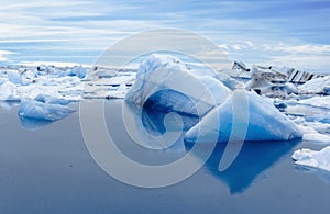 Big blue icebergs in Jokulsarlon glacial lagoon. Iceland.