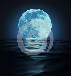 Big Blue Moon Reflected in Dark Water Surface