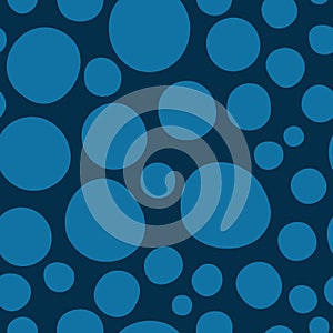 Big blue polka dots on dark blule background vector pattern.