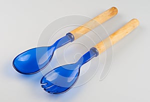 Big blue spoon and fork made of glass