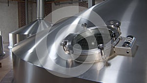 big boiling tank in beer factory workshop, process of mashing malt