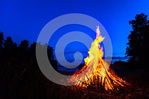 Big bonfire against night sky