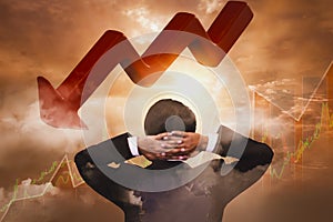 Big boss businessman stress and worried  to see red arrow falling,sunset sky background,concept,business failures and stock is photo