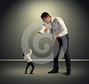 Big boss screaming at the small man