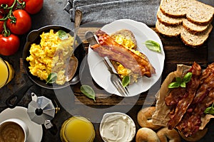 Big breakfast with bacon and scrambled eggs