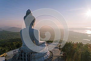 Big buddha over high mountain in Phuket thailand Aerial view drone shot in the morning