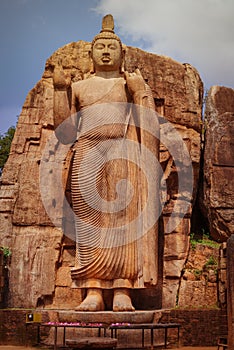 Big Buddha statue carved out of rock. Sri Lanka, Anuradhapura