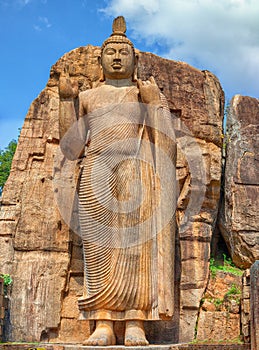 Big Buddha statue carved out of rock. Sri Lanka, Anuradhapura