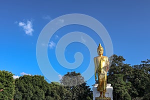 Big Buddha statue on a clear cloudless blue sky background