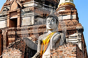 Big Buddha statue in front of temple Wat Yai Chai Mongkol (or Mongkhon) in Ayutthaya, Thailand